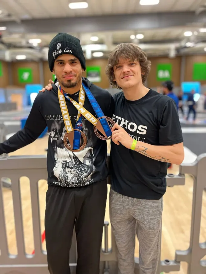 Ethos athlete with a competition medal