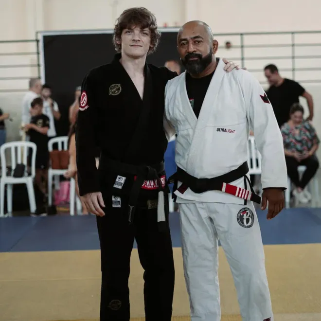 Tyler Schuckman with his professor in Brazil